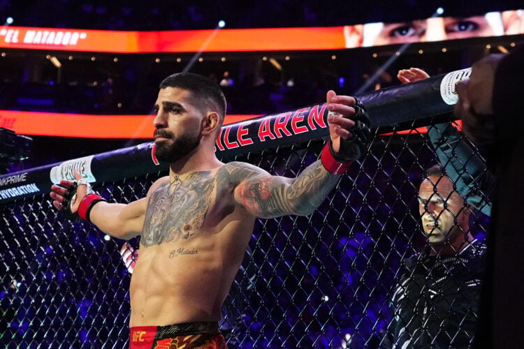 Ilia Topuria enters the Octagon ahead of his lightweight title bout with Charles Oliveira at UFC 317