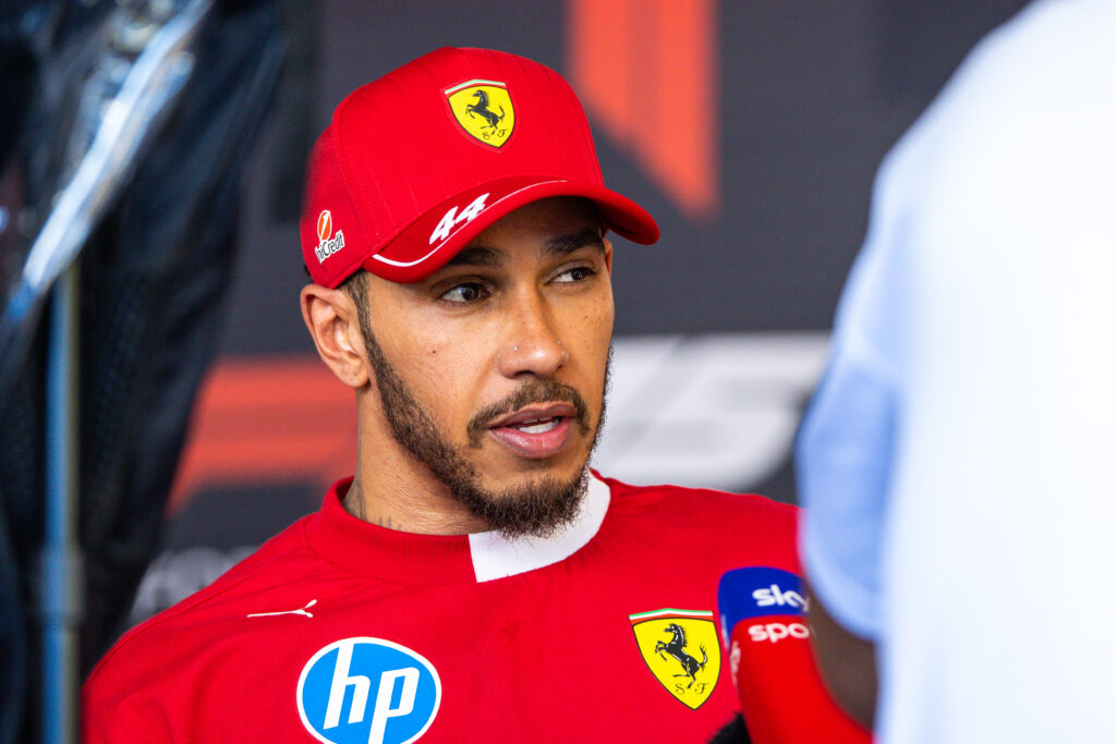 Lewis Hamilton of Ferrari speaks in the media pen during the F1 Grand Prix of Austria