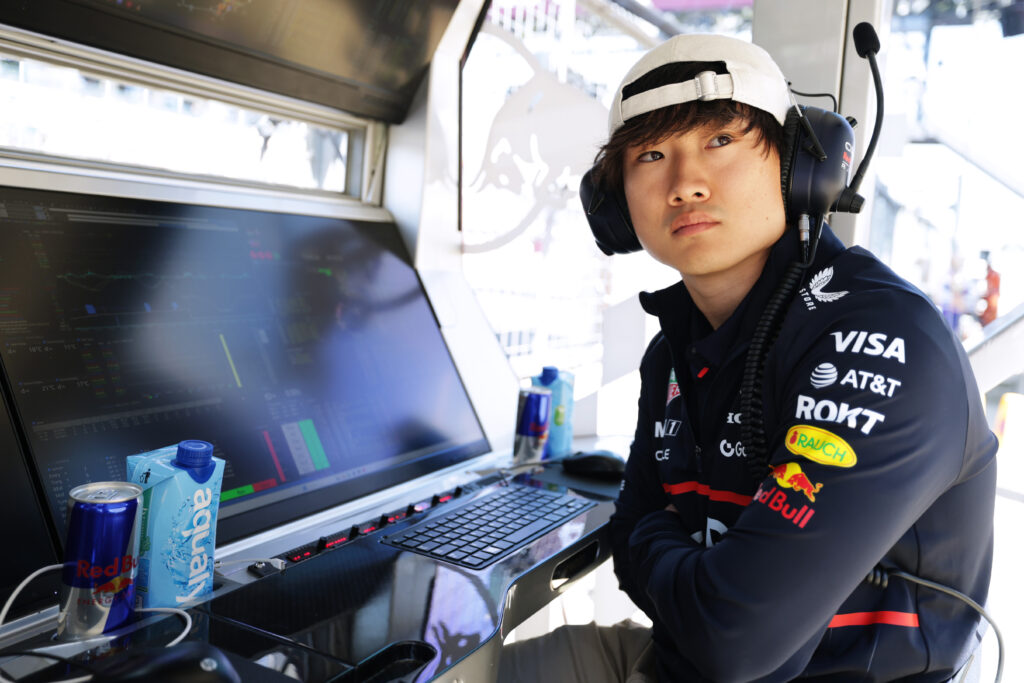 Yuki Tsunoda on the pit wall for Red Bull in the Great British Grand Prix