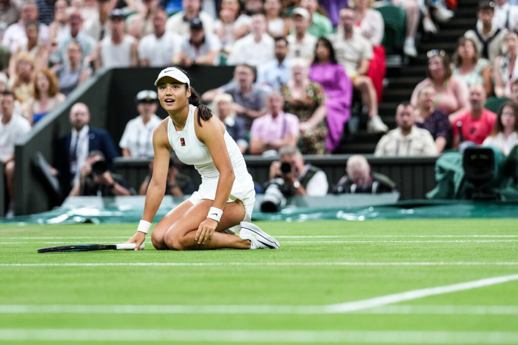 Emma Raducanu reacts in the Ladies' Singles Third Round against Aryna Sabalenka at Wimbledon 2025