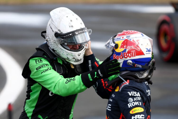 Third placed Nico Hulkenberg of Germany and Stake F1 Team Kick Sauber is congratulated by Max Verstappen of the Netherlands