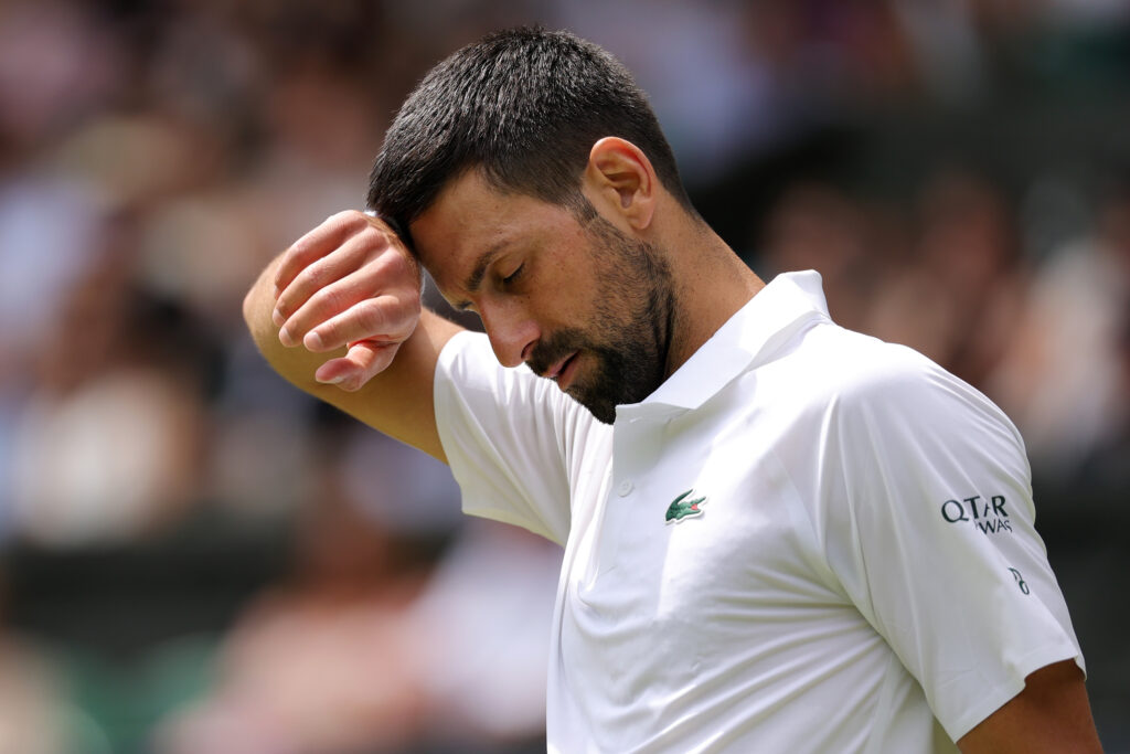 Novak Djokovic looking exasperated against Alex De Minaur at Wimbledon 2025