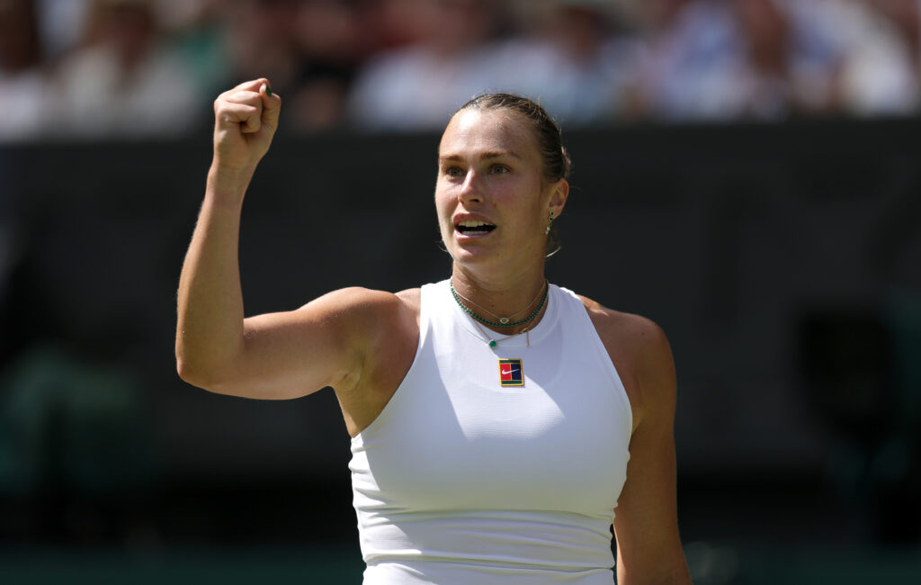 Aryna Sabalenka celebrating a point against Amanda Anisimova