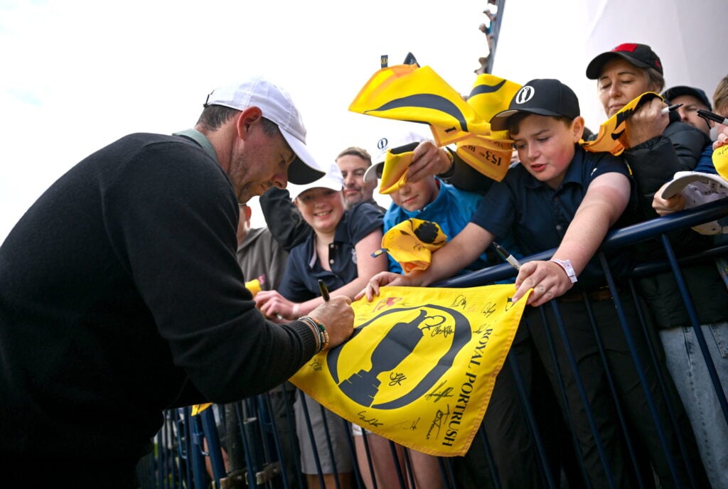 Rory McIlroy of Northern Ireland with supporters during a practice round at Royal Portrush