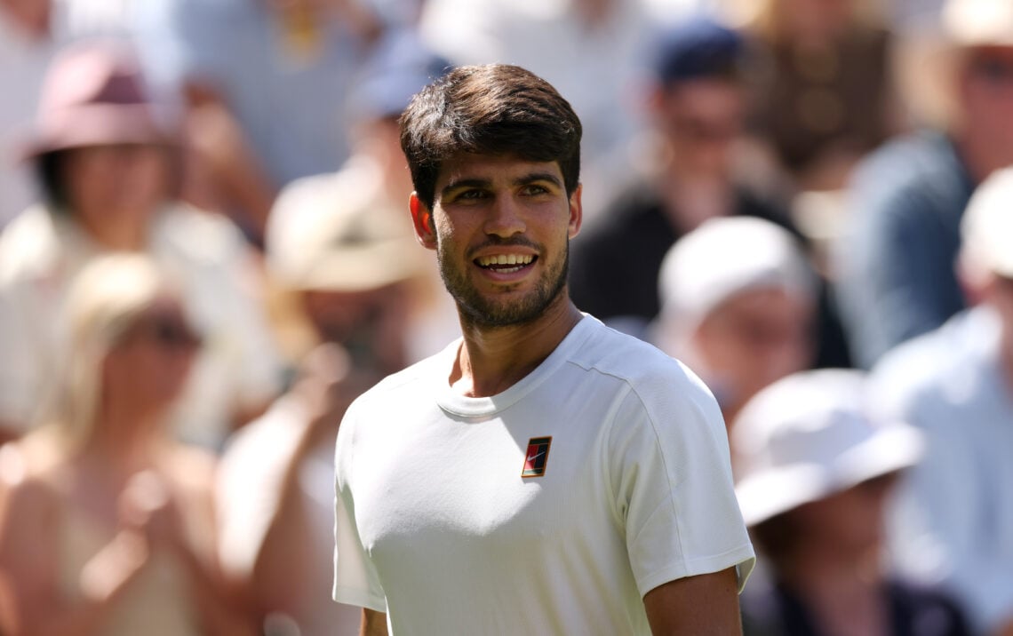 Carlos Alcaraz celebrating a point against Taylor Fritz at Wimbledon 2025