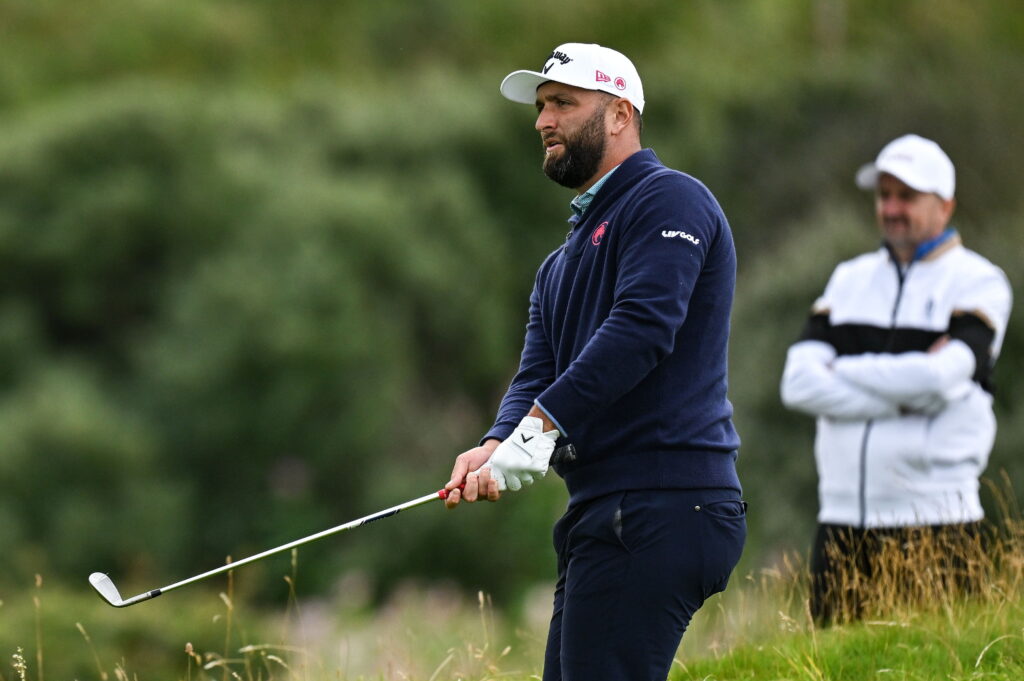 ; Jon Rahm of Spain watches his shot on the fifth hole at the Open Championship