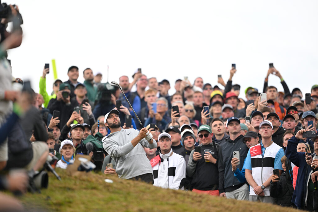 Scottie Scheffler of the United States looks over his ball