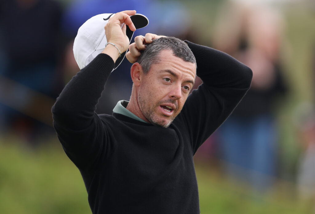 Rory McIlroy of Northern Ireland reacts during a practice round prior to The Open Championship