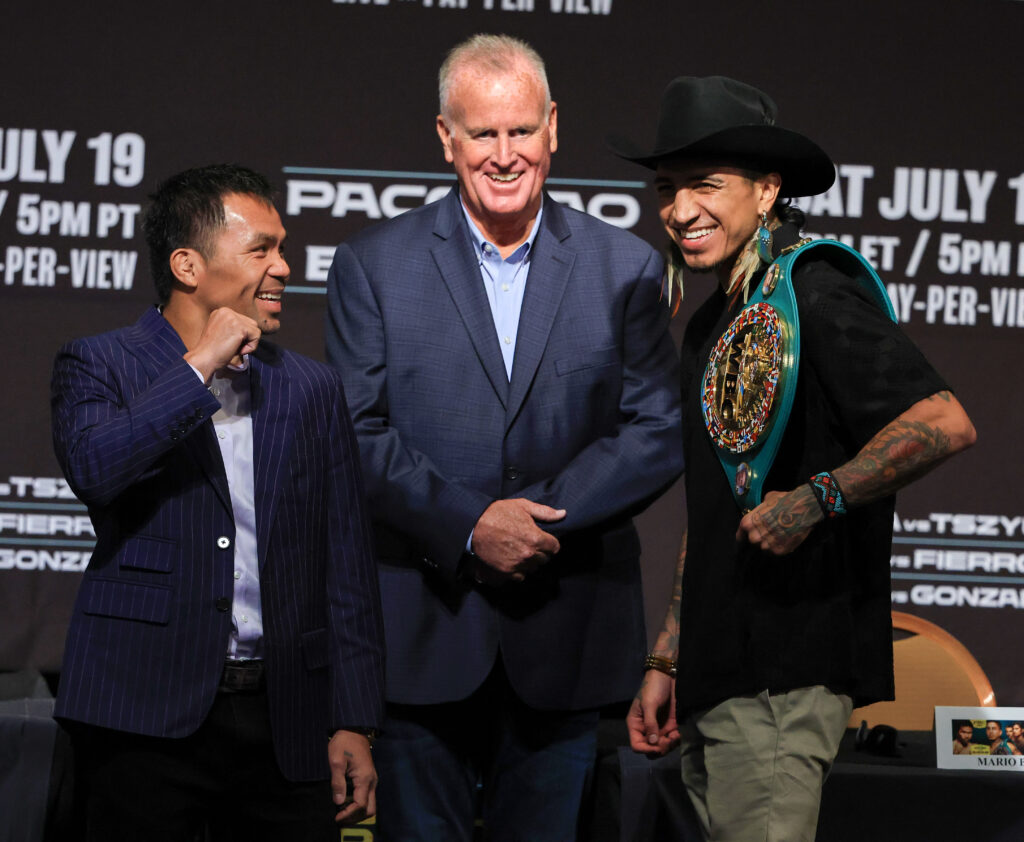 Manny Pacquiao and WBC welterweight champion Mario Barrios pose during their news conference