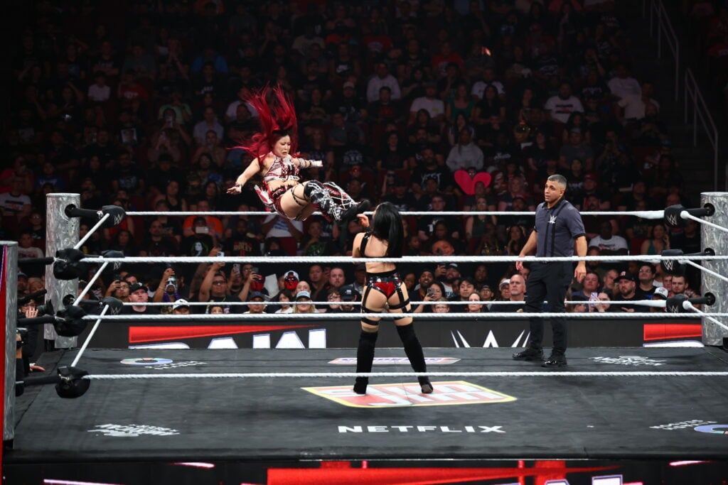 Iyo Sky hitting Stephanie Vaquer with a Missile Dropkick on WWE RAW