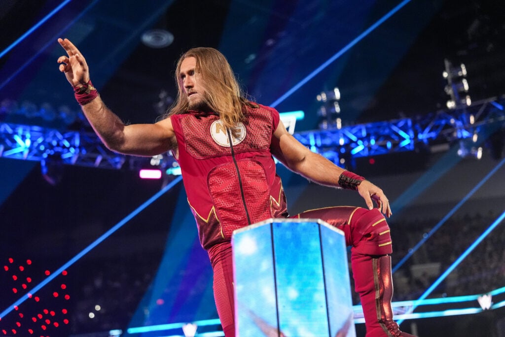 Nathan Frazer posing on the turnbuckle during WWE SmackDown