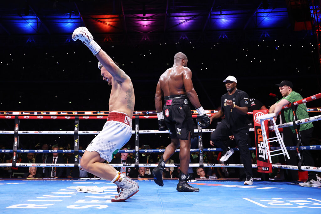 Oleksandr Usyk celebrates victory by knock out over Daniel Dubois
