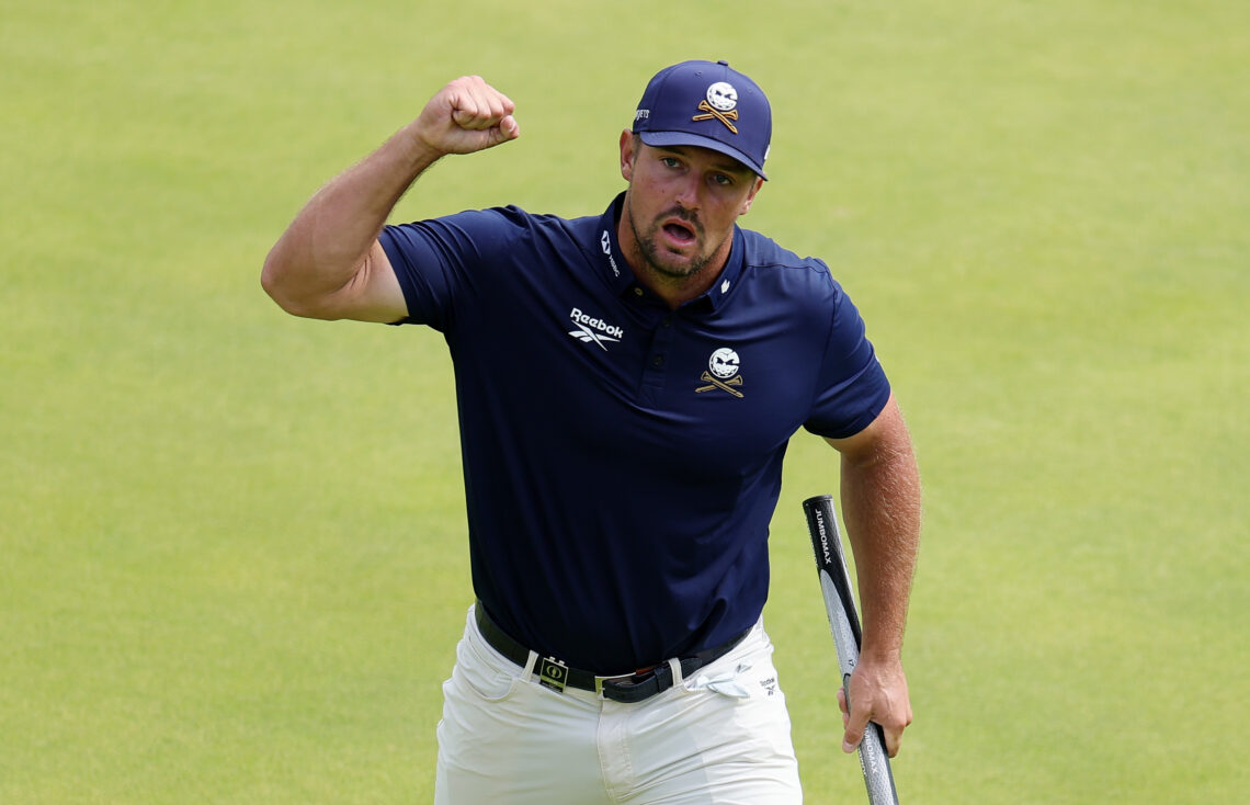 Bryson DeChambeau of the United States celebrates on the 18th green during day four of The 153rd Open Championship.