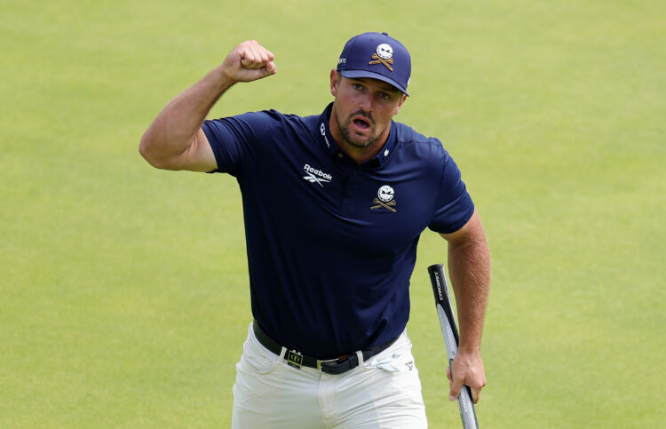 Bryson DeChambeau of the United States celebrates on the 18th green during day four of The 153rd Open Championship.