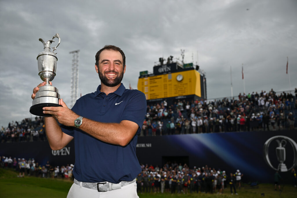 Scottie Scheffler of the United States lifts the Claret Jug