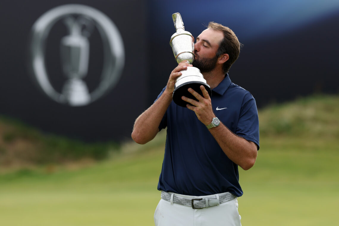 Scottie Scheffler celebrates with the claret jug after winning The Open Championship