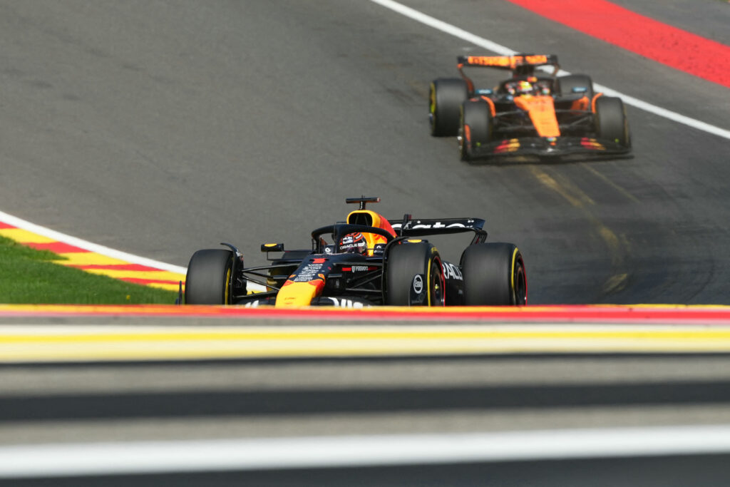 Red Bull Racing's Dutch driver Max Verstappen drives ahead of McLaren's Australian driver Oscar Piastri