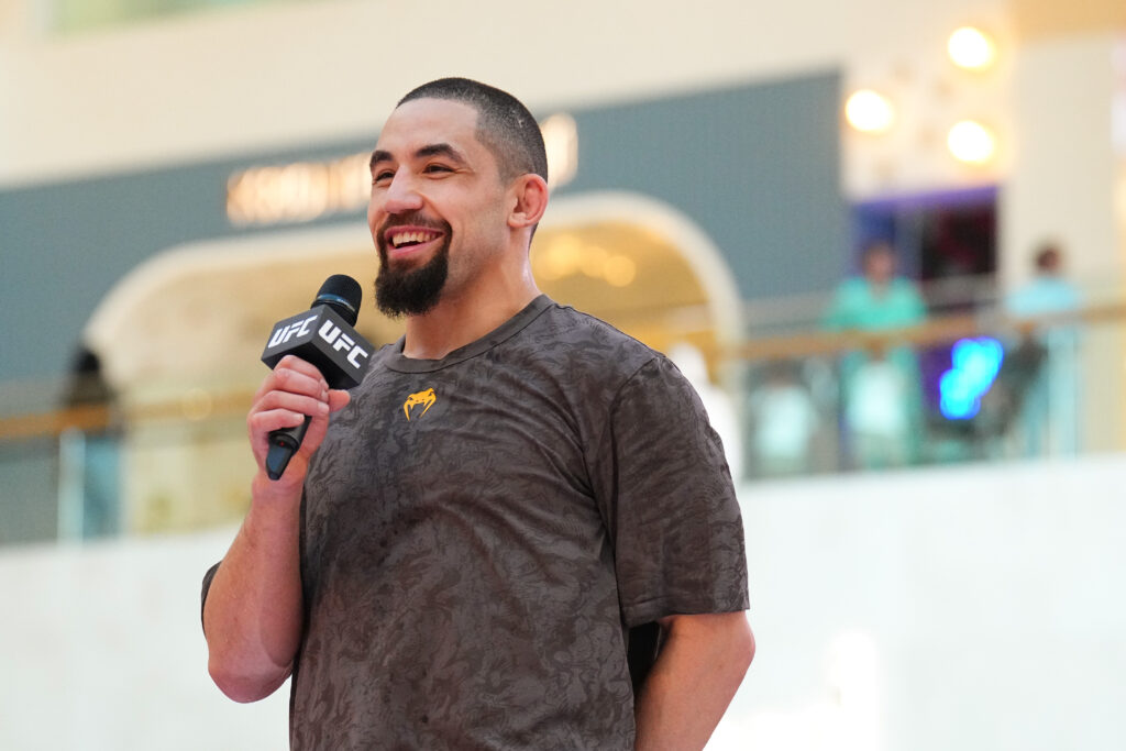 Robert Whittaker works out for fans and media
