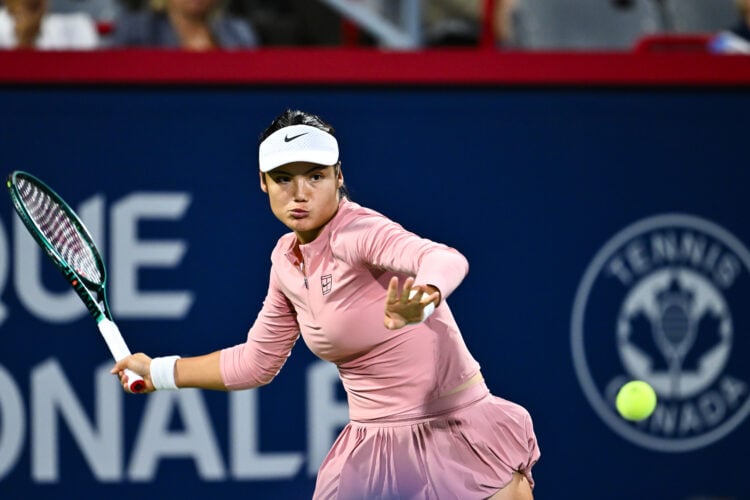 Emma Raducanu hitting a forehand against Amanda Anisimova at the Canadian Open