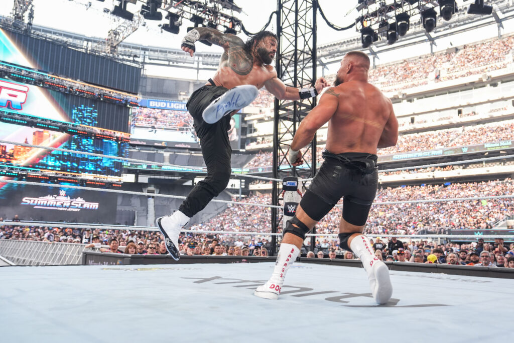 Roman Reigns hitting Bron Breakker with a Superman Punch at WWE SummerSlam