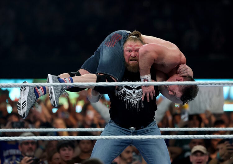 Brock Lesnar hitting John Cena with an F5 at WWE SummerSlam
