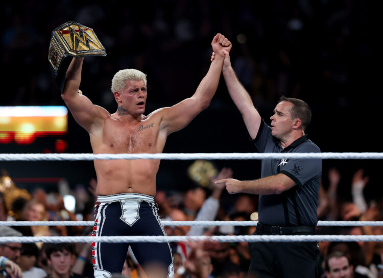 Cody Rhodes lifting the WWE Championship at SummerSlam 2025