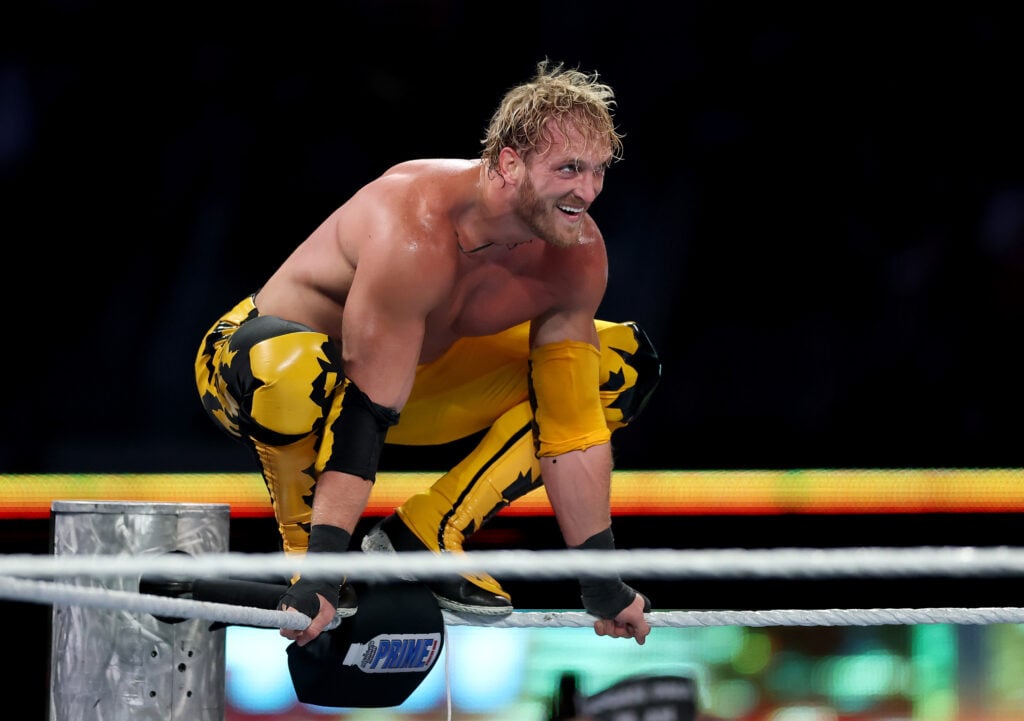 Logan Paul preparing to jump off the top rope during WWE SummerSlam