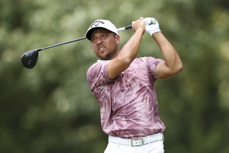 Xander Schauffele hits a tee shot at the St. Jude Championship
