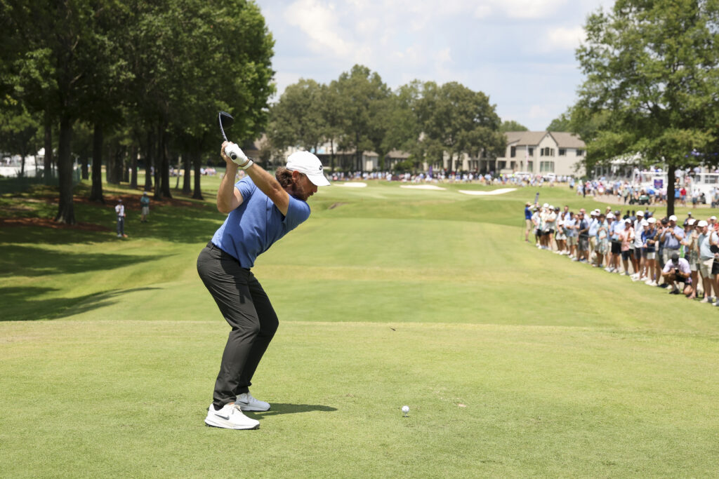 Tommy Fleetwood of England hits a tee shot on the 18th hole during the second round of the FedEx St. Jude Championship