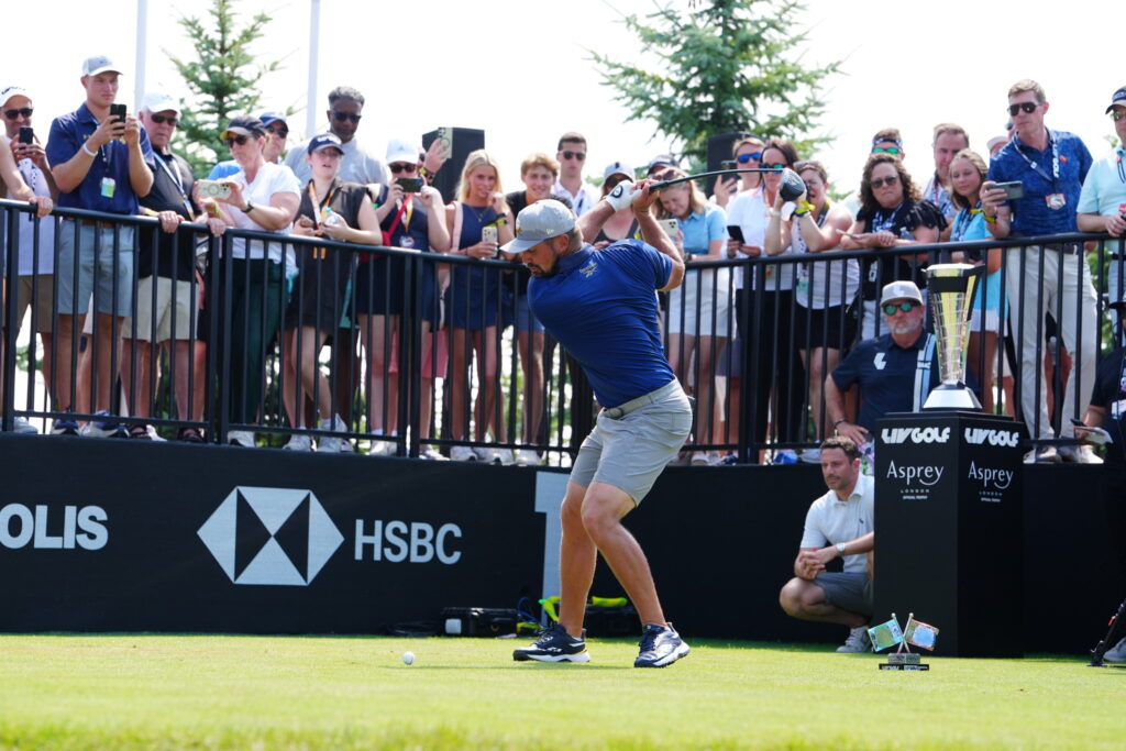 Bryson DeChambeau of Crushers GC plays his tee shot