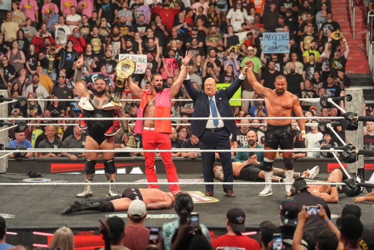 Seth Rollins, Bronson Reed, Bron Breakker, and Paul Heyman standing tall on WWE Monday Night RAW