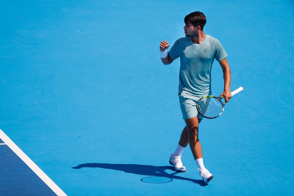 Carlos Alcaraz celebrating a point against Jannik Sinner at the Cincinnati Open