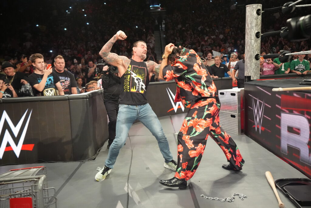 CM Punk and Seth Rollins brawling on WWE Monday Night RAW