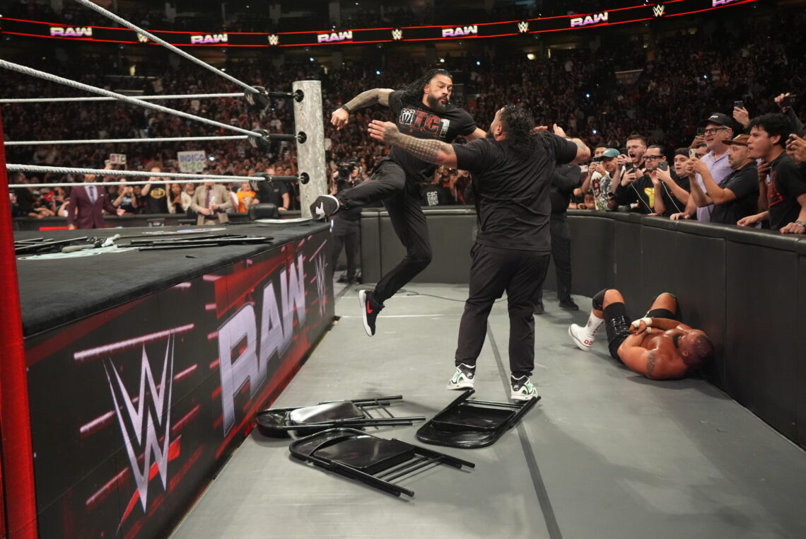 Roman Reigns hitting a Superman Punch on WWE Monday Night RAW