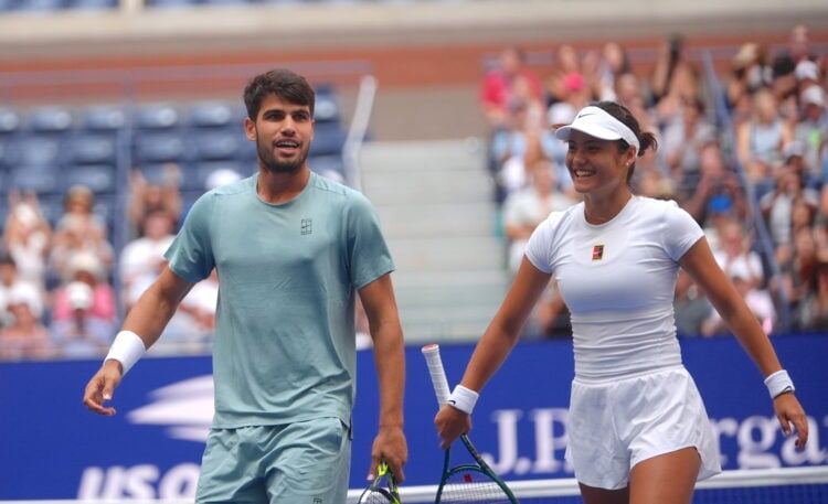 Carlos Alcaraz and Emma Raducanu playing and smiling together at the US Open 2025.