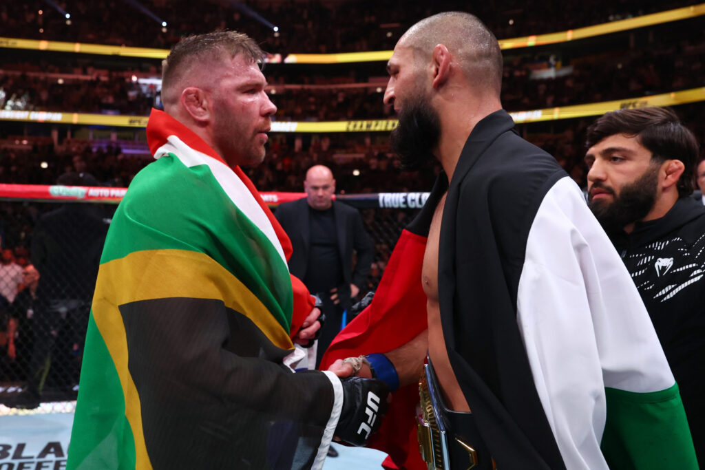 Dricus Du Plessis and Khamzat Chimaev shake hands after UFC 319 title fight