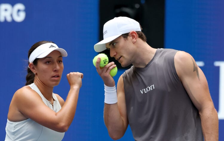 Jessica Pegula of the United States talks to teammate Jack Draper of Great Britain during the mixed doubles match against Daniil Medvedev and Mirra...