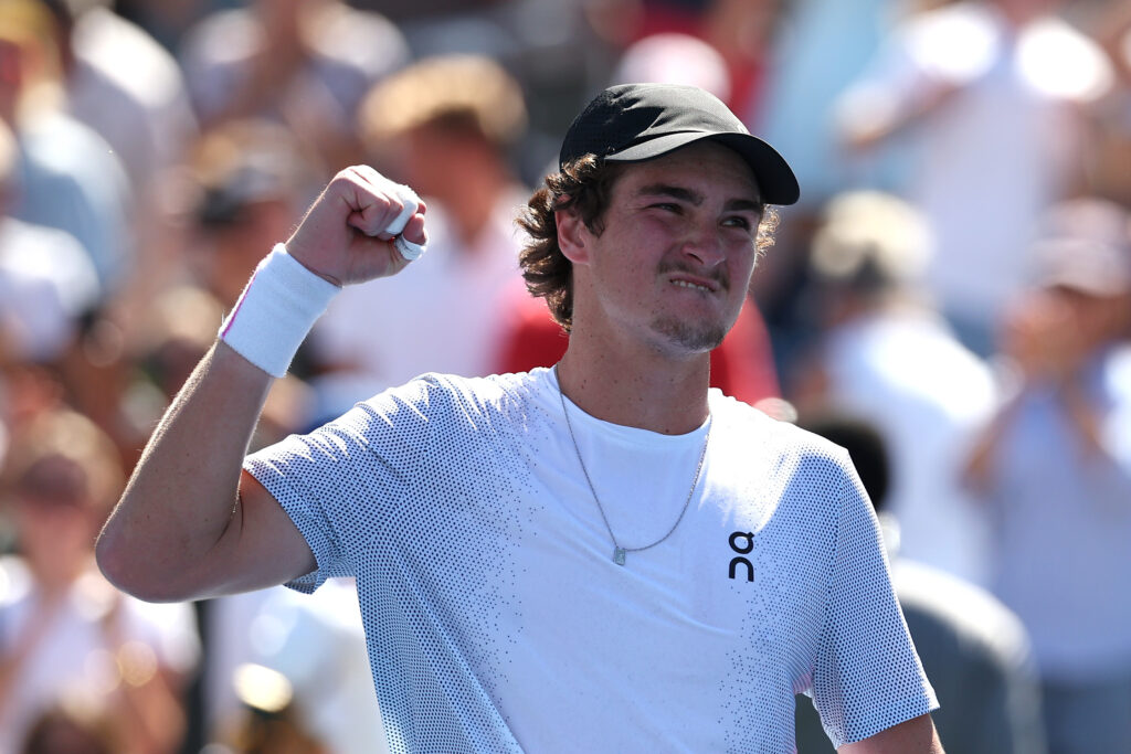 Joao Fonseca celebrating a win against Miomir Kecmanovic at the 2025 US Open
