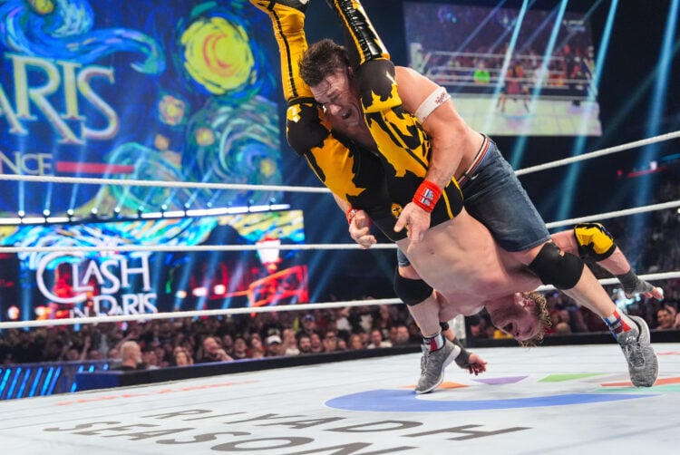 John Cena hitting a Styles Clash on Logan Paul at WWE Clash In Paris