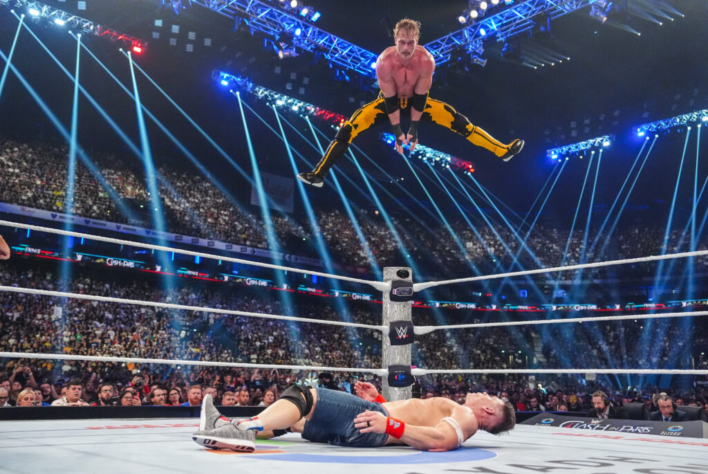 Logan Paul hitting a Frogsplash on John Cena at WWE Clash in Paris