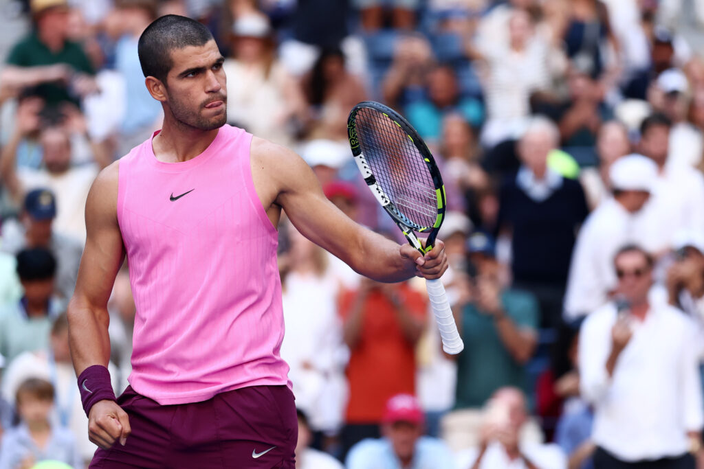 Carlos Alcaraz celebrating his win against Arthur Rinderknech at the 2025 US Open