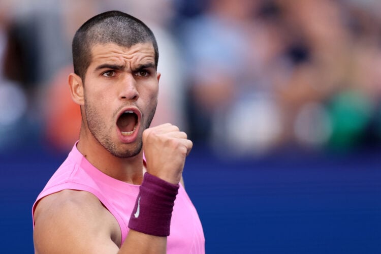Carlos Alcaraz celebrating a point against Arthur Rinderknech at the 2025 US Open