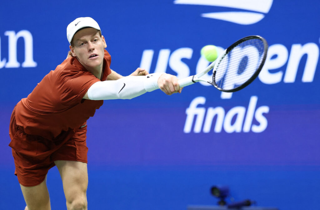 Jannik Sinner returning a Carlos Alcaraz serve in the 2025 US Open final