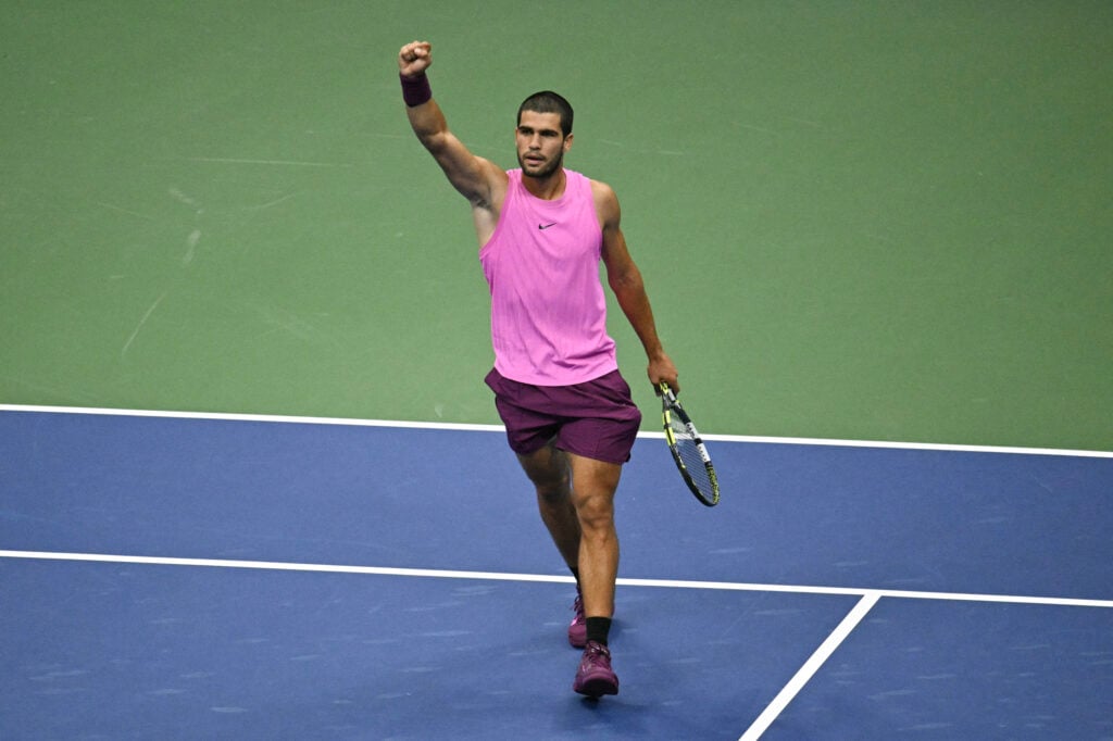 Carlos Alcaraz celebrating a point against Jannik Sinner in the 2025 US Open final