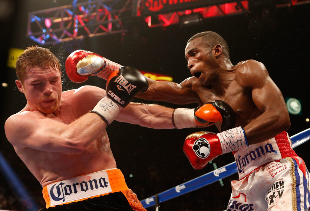Erislandy Lara lands a right to the head of Canelo Alvarez during their junior middleweight bout