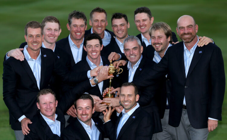 The European team pose with the trophy after winning the Ryder Cup in 2014