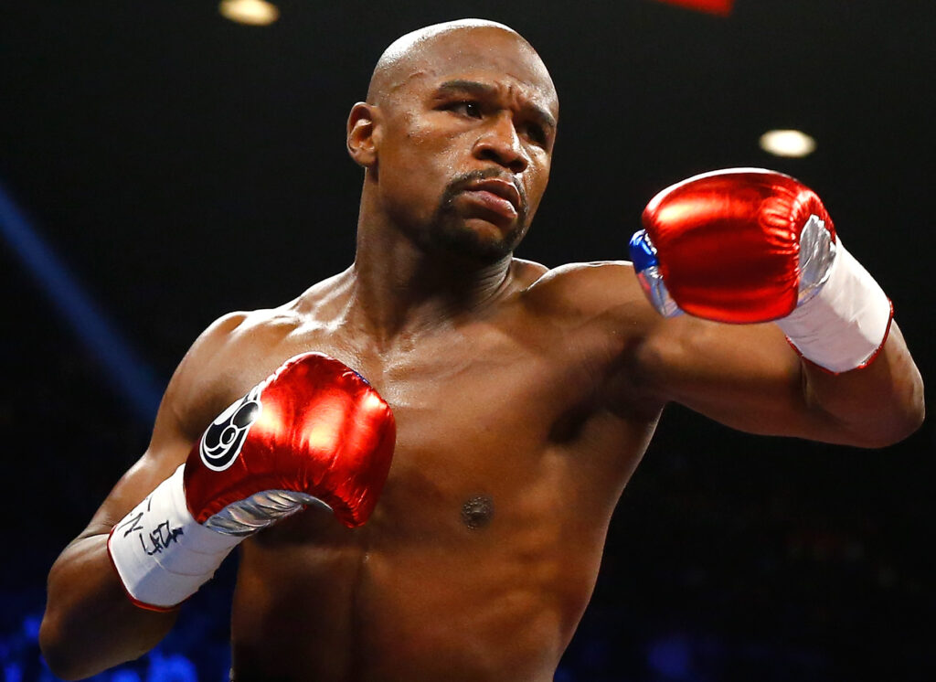 Floyd Mayweather Jr. throws a left at Manny Pacquiao during their welterweight unification championship bout