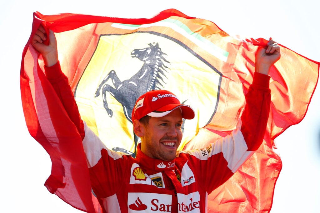 Sebastian Vettel celebrates for Ferrari after finishing second at the 2015 Italian Grand Prix.