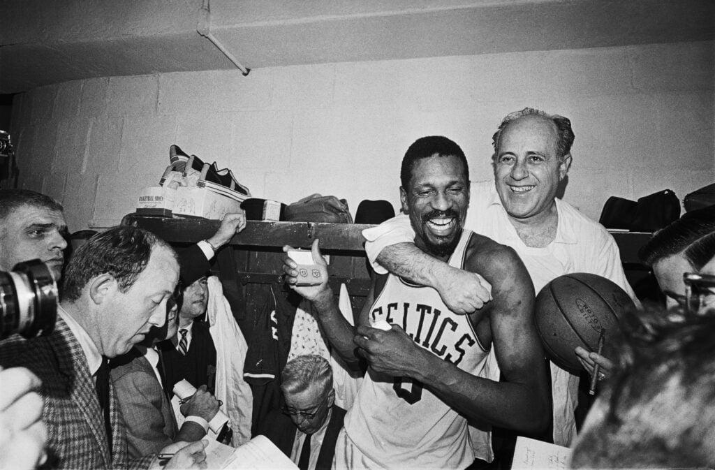 Red Auerbach and Bill Russell celebrating their 8th consecutive NBA title in 1968.