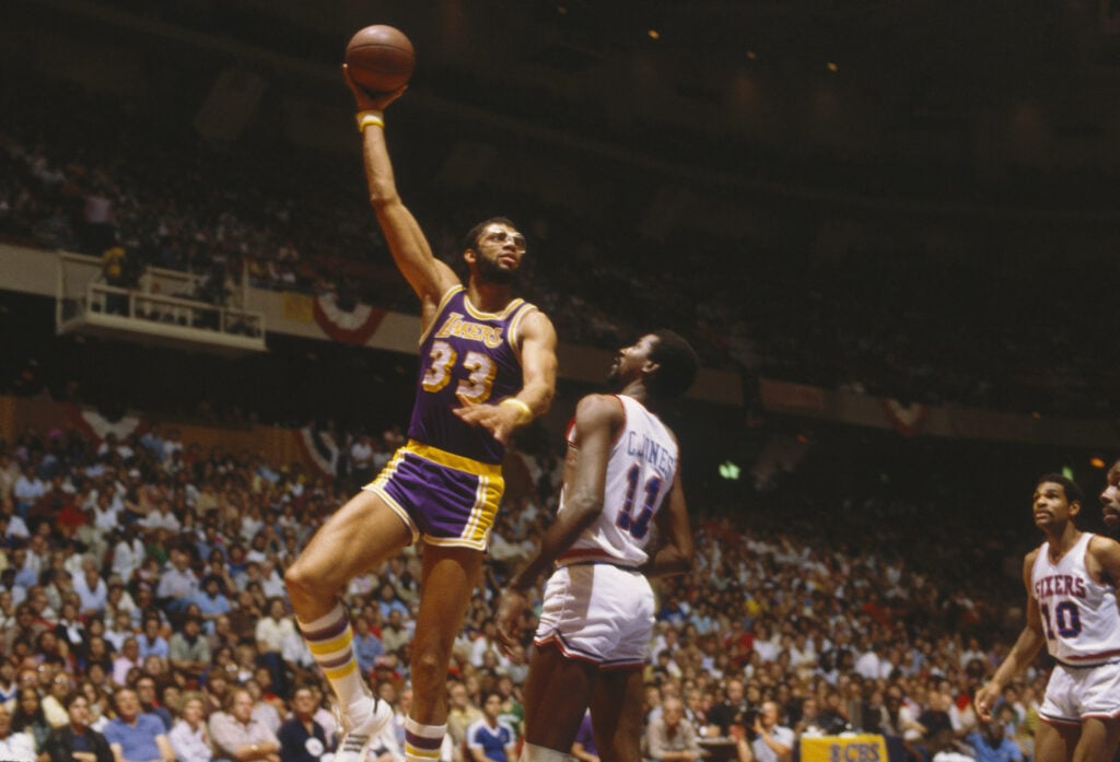 Kareem Abdul-Jabbar using his skyhook to score against the Philadelphia 76ers
